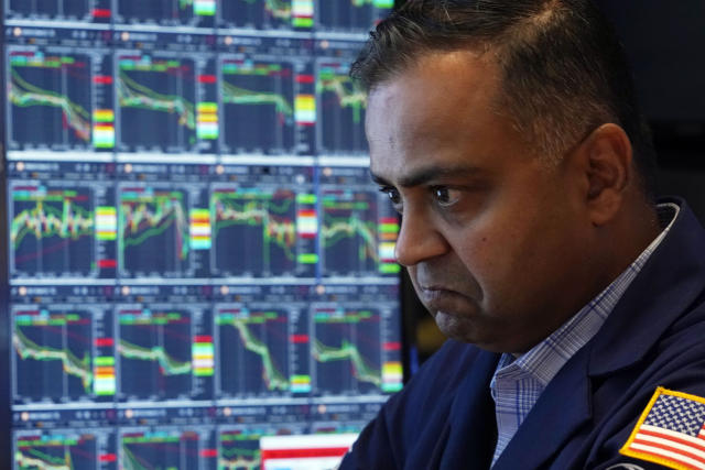 Specialist Dilip Patel works at his post on the floor of the New York Stock Exchange, Monday, Aug. 5, 2024. Nearly everything on Wall Street is tumbling as fear about a slowing U.S. economy worsens and sets off another sell-off for financial markets around the world.(AP Photo/Richard Drew)